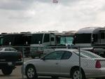 These RV's and buses are where the drivers hang.